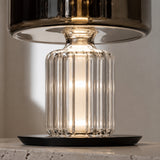 Close-up of the Postmodern lamp ribbed glass pedestal and metal junction