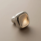 Detailed angled view of Santaya square nickel silver brass furniture handle with PVD finish