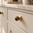 Solvi Brass Ball Cabinet Knobs - Amber Banded - Lifestyle on shaker cabinetry