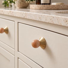 Solvi Brass Ball Cabinet Knobs - Apricot - Lifestyle on cream cabinetry