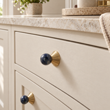 Solvi Brass Ball Cabinet Knobs - Blue Veined - Lifestyle on cream cabinetry