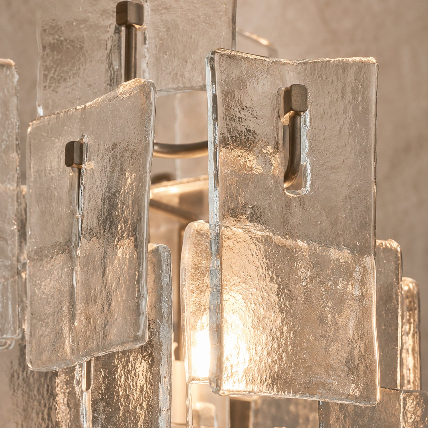 Close-up of the Vintage Medieval wall lamp irregular glass panels and metal hooks