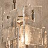 Close-up of the Vintage Medieval wall lamp irregular glass panels and metal hooks