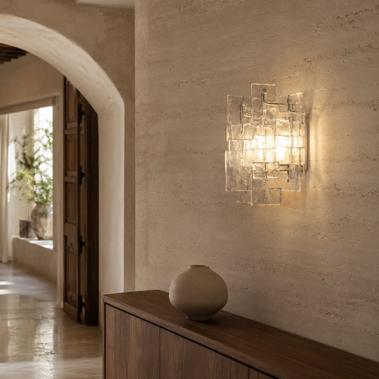 Vintage Medieval transparent glass wall lamp in a warm architectural hallway